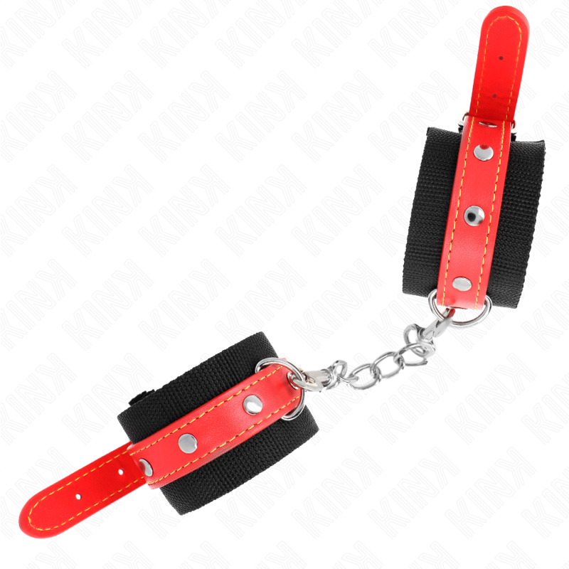 KINK - MENOTTES EN NYLON NOIR AVEC SANGLE EN SIMILI CUIR ROUGE RÉGLABLE 19-24 CM X 5.5 CM