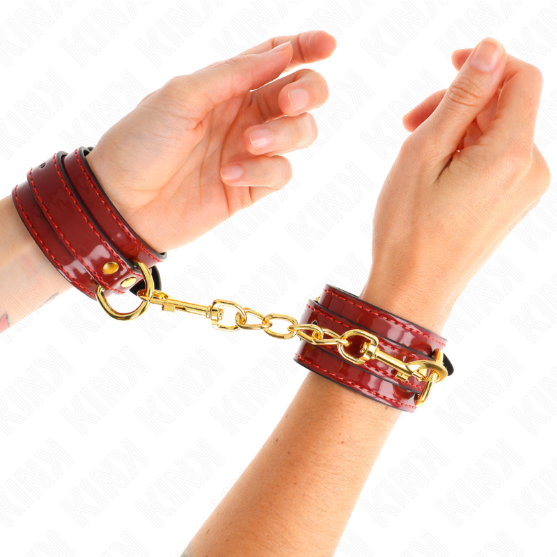 KINK - MENOTTES JOANNA ANGEL ROUGES RÉGLABLES AVEC CHAÎNE DORÉE 16.5-26 CM X 4 CM